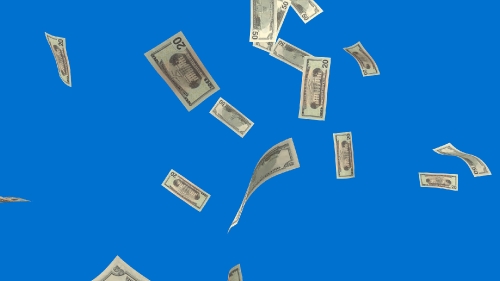 Money falling on blue background
