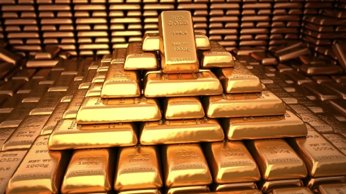 Pyramid of fine gold bars in bank vault or safe
