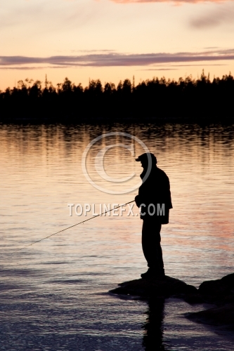 Fisherman silhouette on the beach at colorful sunset 03